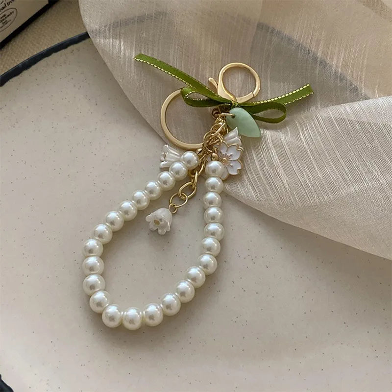 Fresh And Elegant Bell Orchid Keychain For Women Green Sweet Imitation Pearl Leatherresin Alloy Keychain Jewelry Accessory Gifts
