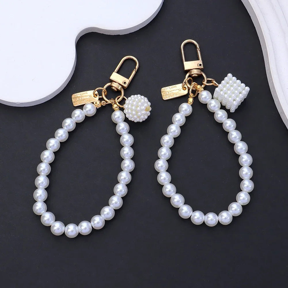 Fashion Rose Flower Bow Pendant Key Ring Anti-Loss Pearl Chain Wristband Keychain For Women Phone Handbag Ornament Party Gifts