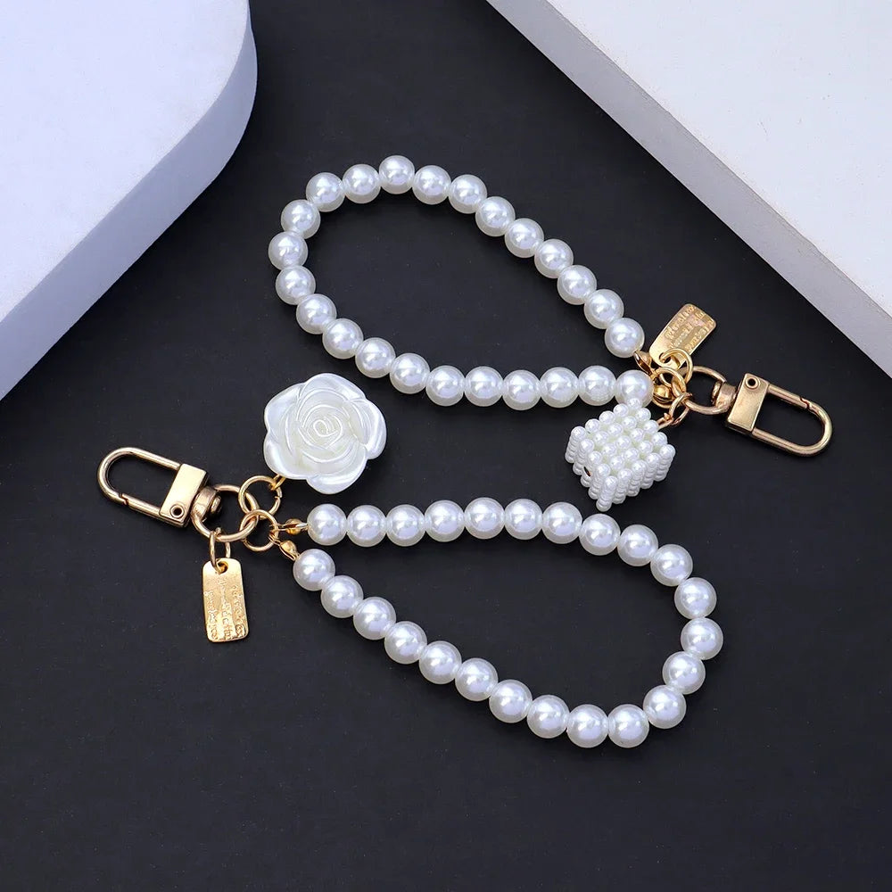 Fashion Rose Flower Bow Pendant Key Ring Anti-Loss Pearl Chain Wristband Keychain For Women Phone Handbag Ornament Party Gifts
