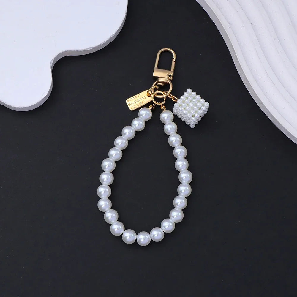 Fashion Rose Flower Bow Pendant Key Ring Anti-Loss Pearl Chain Wristband Keychain For Women Phone Handbag Ornament Party Gifts