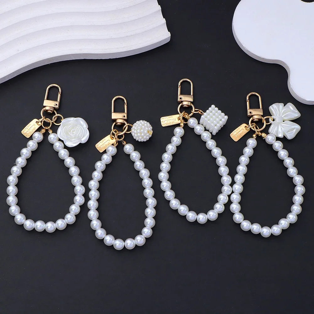 Fashion Rose Flower Bow Pendant Key Ring Anti-Loss Pearl Chain Wristband Keychain For Women Phone Handbag Ornament Party Gifts