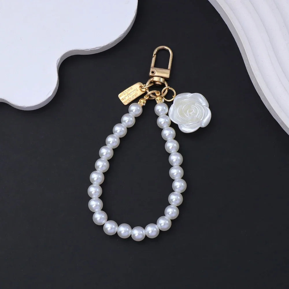 Fashion Rose Flower Bow Pendant Key Ring Anti-Loss Pearl Chain Wristband Keychain For Women Phone Handbag Ornament Party Gifts