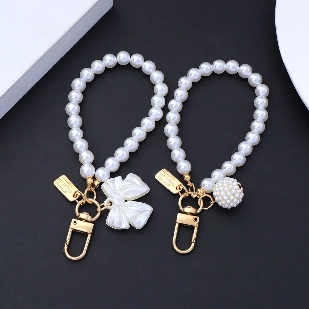 Fashion Rose Flower Bow Pendant Key Ring Anti-Loss Pearl Chain Wristband Keychain For Women Phone Handbag Ornament Party Gifts