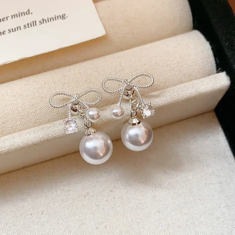 Women's White Bowknot Pearl Tassel Dangle Earrings