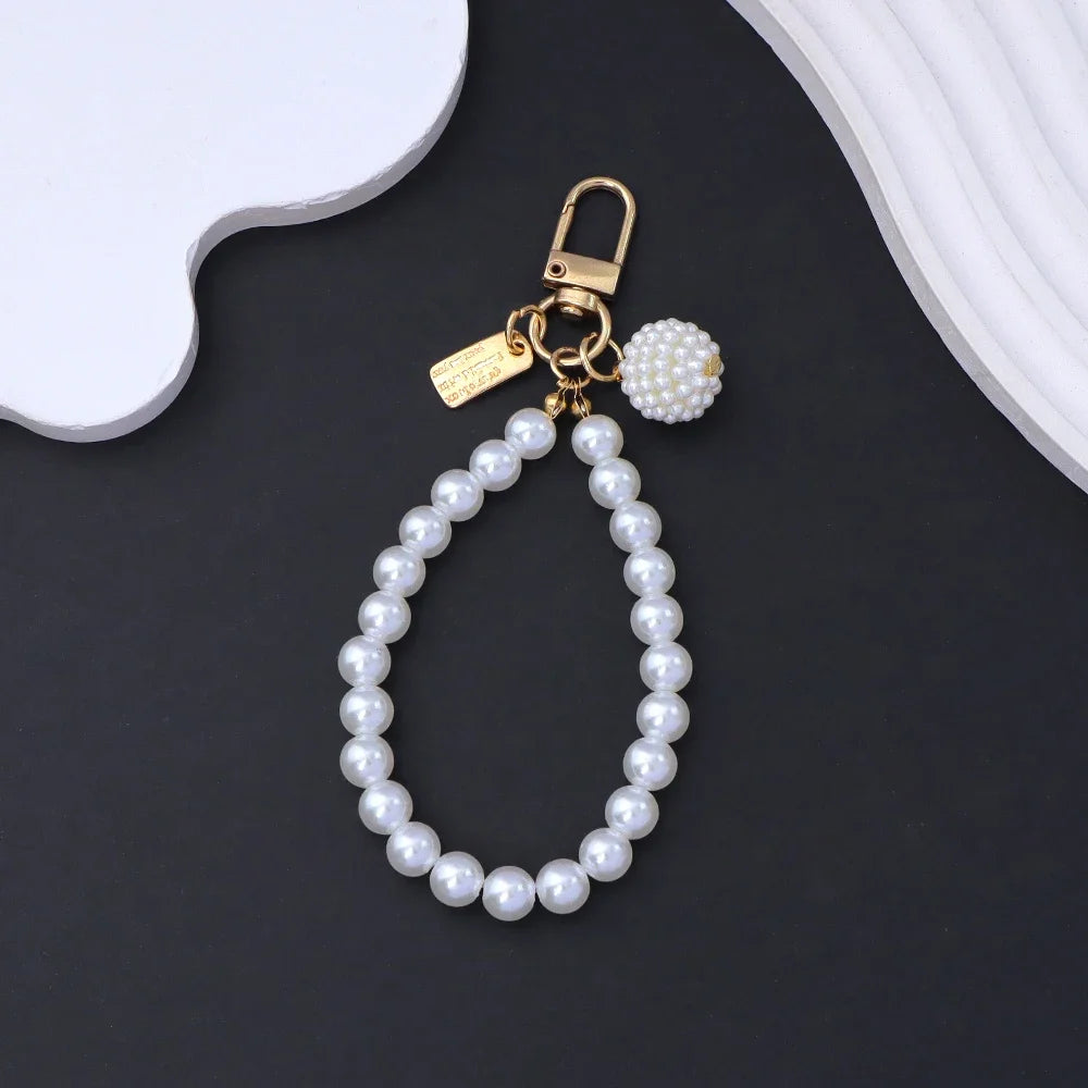 Fashion Rose Flower Bow Pendant Key Ring Anti-Loss Pearl Chain Wristband Keychain For Women Phone Handbag Ornament Party Gifts